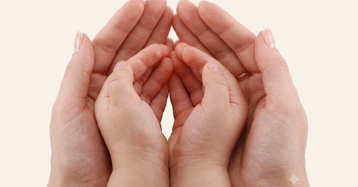 An adult's hands holding a child's, the same person at both ends of a life